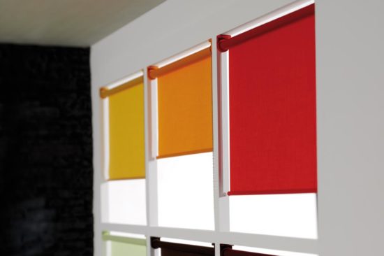 Roller blinds, different coloured fabrics