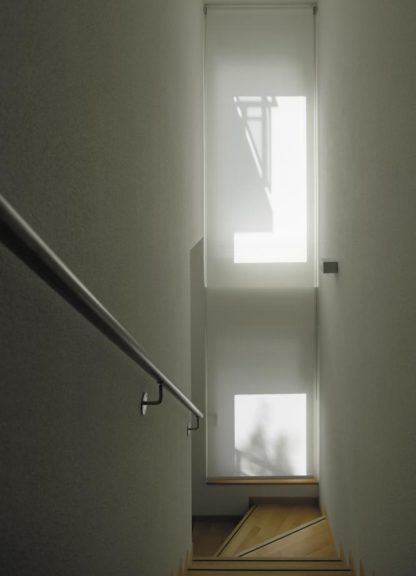 Roller blind system, stairwell